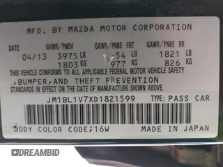2013 Mazda 3 i Touring z VIN JM1BL1V7XD1821599, wystawiony jako IAAI lot #42050760 z przebiegiem 129 006 mil mil oraz . Historia ofert i sprzedaży dostępna na DreamBid. Obrazek 9.