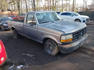 1995 Ford F-150 with VIN 1FTDF15YXSNA29547, listed as a IAAI auction lot 41569707 with 185,000 mi miles. Bid and sale history available at carsss.com. Image 1.