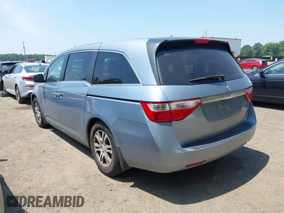 2011 Honda Odyssey EX-L with VIN 5FNRL5H60BB051135, listed as a IAAI auction lot 42588994 with 195,112 mi miles and . Bid and sale history available at DreamBid. Image 3.