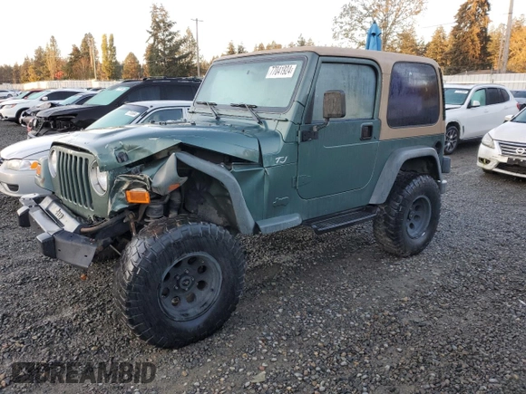 2000 Jeep Wrangler Sport with VIN 1J4FA49S1YP748529, listed as a Copart auction lot 77041924 with 154,949 mi miles and Salvage Title. Bid and sale history available at carsss.com. Image 1.