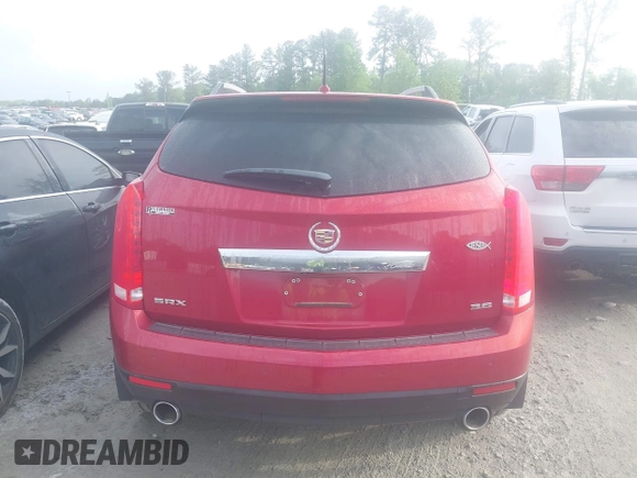 2014 Cadillac SRX Premium Collection with VIN 3GYFNDE36ES564140, listed as a IAAI auction lot 42070008 with 69,768 mi miles and . Bid and sale history available at DreamBid. Image 16.