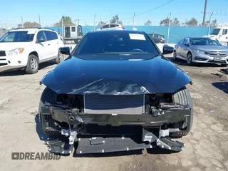 2024 BMW i4 eDrive35 z VIN WBY43AW01RFS94328, wystawiony jako IAAI lot #41734039 z przebiegiem 8959 mil mil oraz . Historia ofert i sprzedaży dostępna na DreamBid. Obrazek 13.