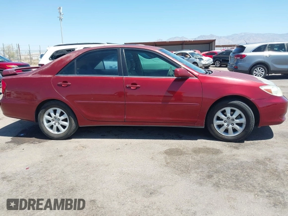 2002 Toyota Camry LE z VIN 4T1BE32K52U082454, wystawiony jako IAAI lot #42276881 z przebiegiem 225 814 mil mil oraz . Historia ofert i sprzedaży dostępna na DreamBid. Obrazek 13.