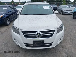 2010 Volkswagen Tiguan with VIN WVGBV9AX2AW513478, listed as a IAAI auction lot 42607466 with 63,780 mi miles and . Bid and sale history available at DreamBid. Image 6.