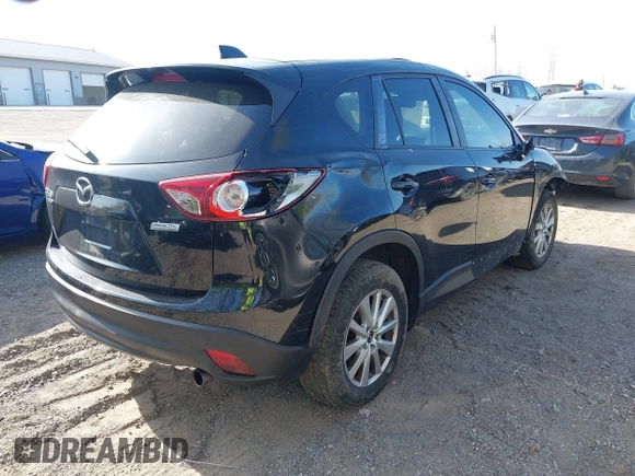2014 Mazda CX-5 Touring z VIN JM3KE4CY4E0328880, wystawiony jako IAAI lot #42112302 z przebiegiem 185 228 mil mil oraz . Historia ofert i sprzedaży dostępna na DreamBid. Obrazek 4.