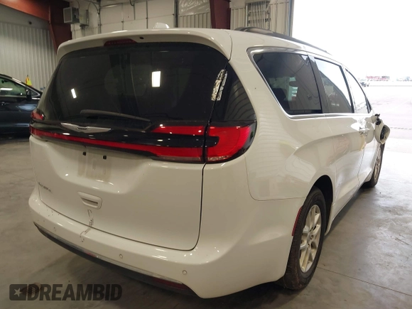 2022 Chrysler Pacifica Touring L with VIN 2C4RC1BGXNR144831, listed as a IAAI auction lot 40473026 with 36,495 mi miles and . Bid and sale history available at DreamBid. Image 4.