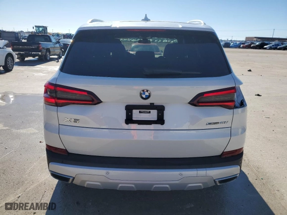 2021 BMW X5 sDrive40i with VIN 5UXCR4C01M9H47129, listed as a Copart auction lot 86374664 with 49,127 mi miles and Clean Title. Bid and sale history available at carsss.com. Image 6.
