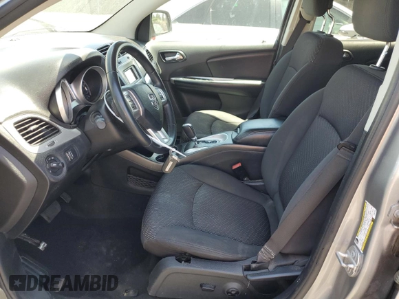 2017 Dodge Journey SXT z VIN 3C4PDCBG7HT547666, wystawiony jako Copart lot #57987875 z przebiegiem 124 484 mil mil oraz Szkoda całkowita • Salvage title. Historia ofert i sprzedaży dostępna na DreamBid. Obrazek 7.