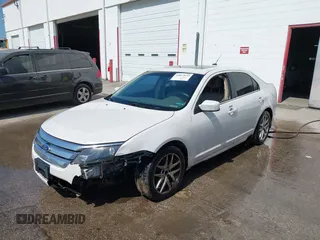 2011 Ford Fusion SEL with VIN 3FAHP0JAXBR124596, listed as a IAAI auction lot 42019623 with 239,177 mi miles and . Bid and sale history available at carsss.com. Image 2.