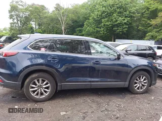 2019 Mazda CX-9 Touring with VIN JM3TCBCY6K0334898, listed as a IAAI auction lot 42467677 with 69,454 mi miles and . Bid and sale history available at DreamBid. Image 13.