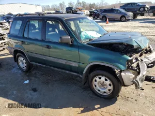 1999 Honda CR-V LX with VIN JHLRD184XXC083344, listed as a Copart auction lot 86395264 with 165,141 mi miles and Salvage Title. Bid and sale history available at carsss.com. Image 4.
