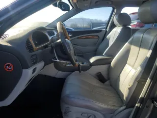 2003 Jaguar S-Type z VIN SAJEA01U03HM57757, wystawiony jako Copart lot #73440434 z przebiegiem 188 389 mil mil oraz Szkoda całkowita • Salvage title. Historia ofert i sprzedaży dostępna na DreamBid. Obrazek 7.