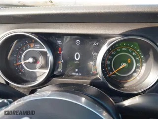 2023 Jeep Gladiator Overland with VIN 1C6HJTFG1PL553343, listed as a IAAI auction lot 41349518 with 19,556 mi miles. Bid and sale history available at carsss.com. Image 7.