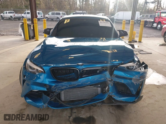 2018 BMW M2 z VIN WBS1J5C59JVA12718, wystawiony jako IAAI lot #41796602 z przebiegiem 53 707 mil mil oraz . Historia ofert i sprzedaży dostępna na DreamBid. Obrazek 13.