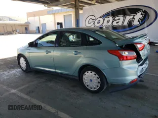 2012 Ford Focus SE with VIN 1FAHP3F23CL263018, listed as a Copart auction lot 55975335 with 167,823 mi miles and Salvage title. Bid and sale history available at DreamBid. Image 2.