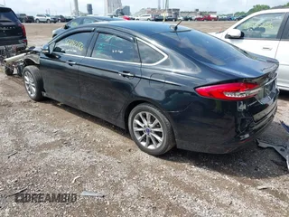 2017 Ford Fusion SE with VIN 3FA6P0HDXHR405345, listed as a IAAI auction lot 42462183 with 149,185 mi miles and . Bid and sale history available at DreamBid. Image 3.
