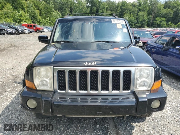 2007 Jeep Commander Overland z VIN 1J8HG68217C564894, wystawiony jako Copart lot #64382215 z przebiegiem 221 815 mil mil oraz Szkoda całkowita • Salvage title. Historia ofert i sprzedaży dostępna na DreamBid. Obrazek 5.