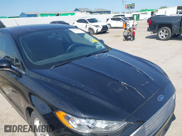 2018 Ford Fusion SE z VIN 3FA6P0H74JR125761, wystawiony jako IAAI lot #41992708 z przebiegiem 102 242 mil mil oraz . Historia ofert i sprzedaży dostępna na DreamBid. Obrazek 6.