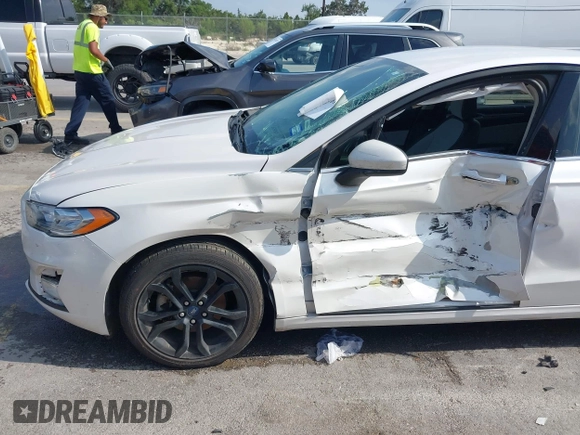 2020 Ford Fusion SE with VIN 3FA6P0HD3LR161093, listed as a IAAI auction lot 42127161 with 59,607 mi miles and . Bid and sale history available at DreamBid. Image 6.