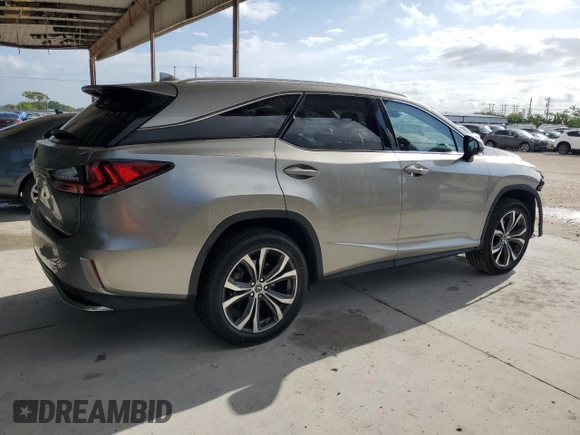 2020 Lexus RX 350L with VIN JTJHZKEA1L2015764, listed as a Copart auction lot 58324465 with 54,860 mi miles and Salvage title. Bid and sale history available at DreamBid. Image 3.