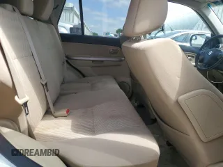 2013 Suzuki Grand Vitara Premium z VIN JS3TE0D62D4100310, wystawiony jako Copart lot #54916065 z przebiegiem 116 428 mil mil oraz Szkoda całkowita • Salvage title. Historia ofert i sprzedaży dostępna na DreamBid. Obrazek 11.