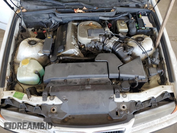 1997 BMW 3 Series 318i с VIN WBACC0321VEK21731, выставлен на аукционе Copart как лот 61555675 с пробегом 115 712 миль миль и Чистый • Clean title. История ставок и продаж доступна на DreamBid. Изображение 11.