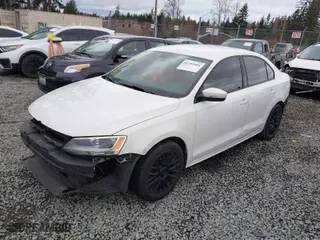 2011 Volkswagen Jetta Sedan SE w/Convenience with VIN 3VWDX7AJ7BM304288, listed as a IAAI auction lot 41702884 with 144,839 mi miles. Bid and sale history available at carsss.com. Image 2.