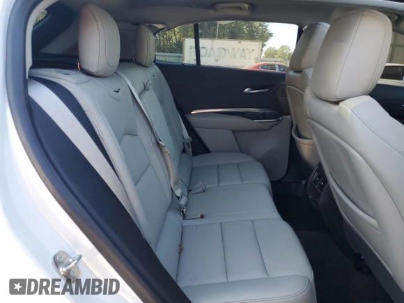 2019 Cadillac XT4 FWD Luxury z VIN 1GYAZAR45KF110798, wystawiony jako Copart lot #58872555 z przebiegiem 31 631 mil mil oraz Nie do naprawy • Non repairable. Historia ofert i sprzedaży dostępna na DreamBid. Obrazek 11.