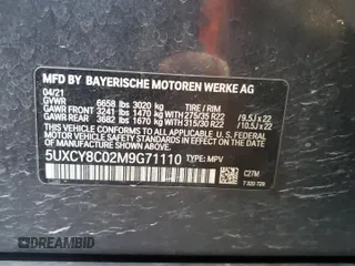 2021 BMW X6 M50i with VIN 5UXCY8C02M9G71110, listed as a Copart auction lot 76124114 with 0 mi miles and Salvage Title. Bid and sale history available at carsss.com. Image 12.
