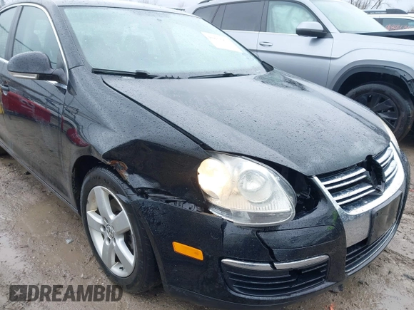 2009 Volkswagen Jetta Sedan SE with VIN 3VWRM71K39M061922, listed as a IAAI auction lot 41833902 with 207,905 mi miles. Bid and sale history available at carsss.com. Image 6.