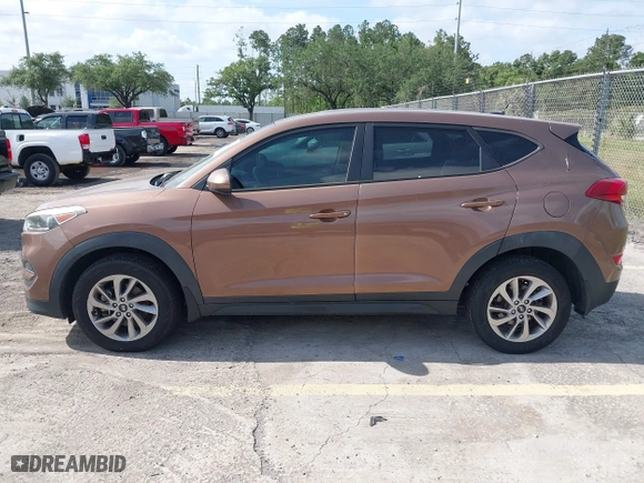 2016 Hyundai Tucson SE with VIN KM8J23A4XGU180300, listed as a IAAI auction lot 42123067 with 123,804 mi miles. Bid and sale history available at carsss.com. Image 14.