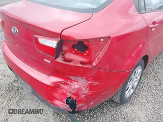 2013 Kia Rio LX with VIN KNADM4A30D6179274, listed as a IAAI auction lot 42014845 with 115,238 mi miles. Bid and sale history available at carsss.com. Image 6.