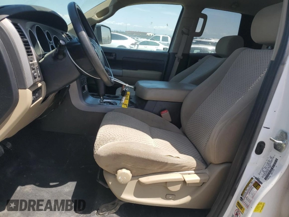 2012 Toyota Tundra with VIN 5TFRM5F14CX039145, listed as a Copart auction lot 56520015 with 129,114 mi miles and Salvage title. Bid and sale history available at DreamBid. Image 7.