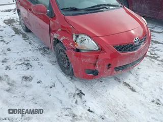 2009 Toyota Yaris with VIN JTDBT903991314767, listed as a IAAI auction lot 41615264 with 252,957 mi miles. Bid and sale history available at carsss.com. Image 6.