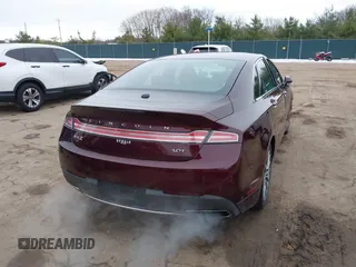 2017 Lincoln MKZ Select z VIN 3LN6L5CC3HR620854, wystawiony jako IAAI lot #41042376 z przebiegiem 131 517 mil mil oraz . Historia ofert i sprzedaży dostępna na DreamBid. Obrazek 4.