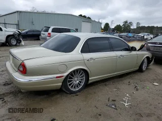 2006 Jaguar XJ with VIN SAJWA79B76SH08803, listed as a Copart auction lot 40268774 with 0 mi miles and Salvage Title. Bid and sale history available at carsss.com. Image 3.