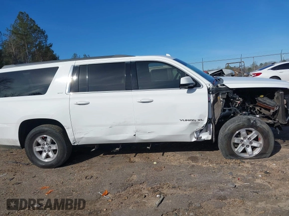 2016 GMC Yukon XL SLT z VIN 1GKS1GKC7GR434044, wystawiony jako IAAI lot #41732031 z przebiegiem 155 416 mil mil oraz . Historia ofert i sprzedaży dostępna na DreamBid. Obrazek 14.