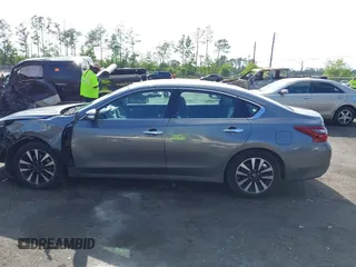 2018 Nissan Altima 2.5 SR with VIN 1N4AL3AP3JC127999, listed as a IAAI auction lot 42016201 with 120,628 mi miles. Bid and sale history available at carsss.com. Image 14.