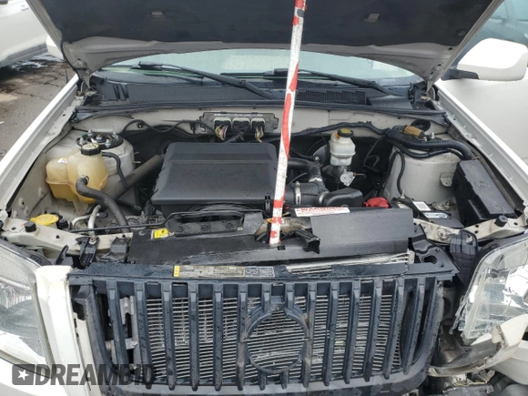 2009 Mercury Mariner Premier z VIN 4M2CU87GX9KJ02081, wystawiony jako Copart lot #49887065 z przebiegiem 135 603 mil mil oraz Czysty tytuł • Clean title. Historia ofert i sprzedaży dostępna na DreamBid. Obrazek 14.