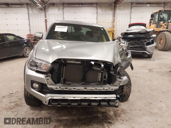 2023 Toyota Tacoma SR z VIN 3TMCZ5AN4PM597509, wystawiony jako IAAI lot #42020023 z przebiegiem 36 941 mil mil oraz . Historia ofert i sprzedaży dostępna na DreamBid. Obrazek 12.