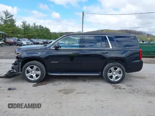 2017 Chevrolet Tahoe LT with VIN 1GNSKBKC5HR233537, listed as a IAAI auction lot 42051281 with 102,778 mi miles and . Bid and sale history available at DreamBid. Image 14.