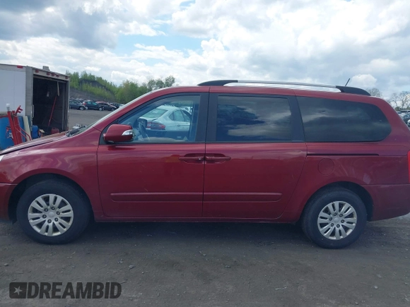 2012 Kia Sedona LX with VIN KNDMG4C76C6453523, listed as a IAAI auction lot 42189376 with 207,557 mi miles. Bid and sale history available at carsss.com. Image 6.