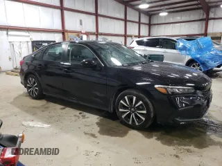 2024 Honda Civic EX z VIN 2HGFE1F7XRH303951, wystawiony jako Copart lot #58736045 z przebiegiem 5 871 mil mil oraz Szkoda całkowita • Salvage title. Historia ofert i sprzedaży dostępna na DreamBid. Obrazek 4.