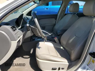 2012 Ford Fusion SEL with VIN 3FAHP0JA0CR432748, listed as a Copart auction lot 52360485 with 168,542 mi miles and Salvage Title. Bid and sale history available at DreamBid. Image 7.