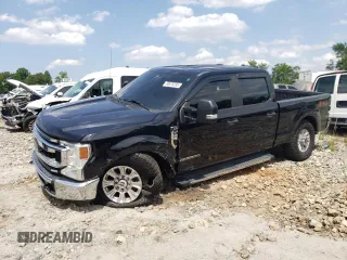 2020 Ford F-250 XL with VIN 1FT8W2BTXLEE30615, listed as a Copart auction lot 60626295 with 142,318 mi miles and Salvage title. Bid and sale history available at DreamBid. Image 1.