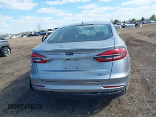 2020 Ford Fusion SE z VIN 3FA6P0LU8LR163896, wystawiony jako IAAI lot #41994803 z przebiegiem 89 892 mil mil oraz . Historia ofert i sprzedaży dostępna na DreamBid. Obrazek 16.
