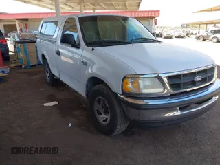 1997 Ford F-150 with VIN 1FTDF1761VKA25260, listed as a IAAI auction lot 41886320 with 203,753 mi miles and . Bid and sale history available at DreamBid. Image 1.