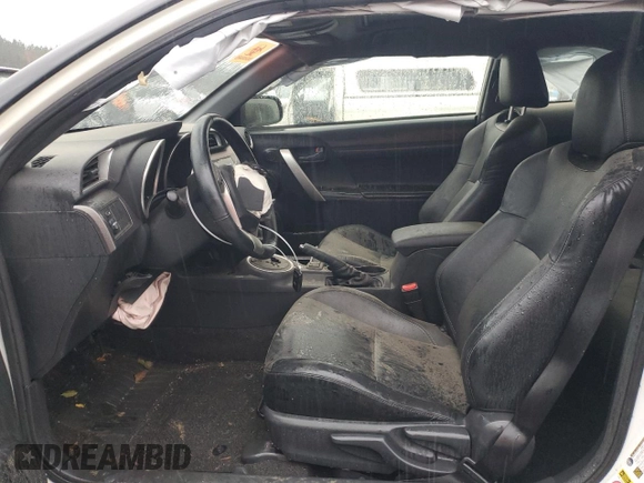 2014 Scion tC z VIN JTKJF5C78E3086696, wystawiony jako Copart lot #84040544 z przebiegiem 83 973 mil mil oraz Szkoda całkowita • Salvage title. Historia ofert i sprzedaży dostępna na DreamBid. Obrazek 7.