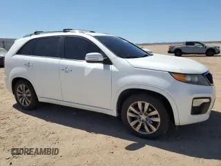 2012 Kia Sorento SX with VIN 5XYKW4A27CG255449, listed as a Copart auction lot 63225045 with 237,061 mi miles and Salvage title. Bid and sale history available at DreamBid. Image 4.