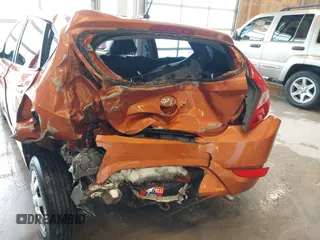 2015 Hyundai Accent GS with VIN KMHCT5AE6FU211955, listed as a IAAI auction lot 41610857 with 106,497 mi miles. Bid and sale history available at carsss.com. Image 6.